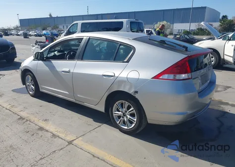 2011 Honda Insight Ex z USA, uszkodzony, nr VIN JHMZE2H74BS012115